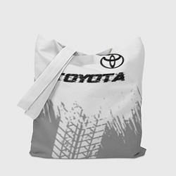 Сумка-шоппер Toyota speed на светлом фоне со следами шин: симво
