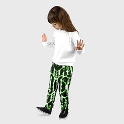 Брюки детские Техно белые линии с зелёной обводкой на чёрном фон, цвет: 3D-принт — фото 2